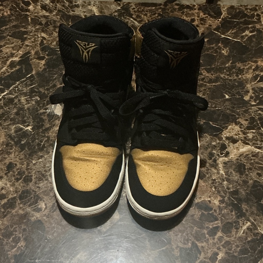 Nike Black and Gold High-Tops